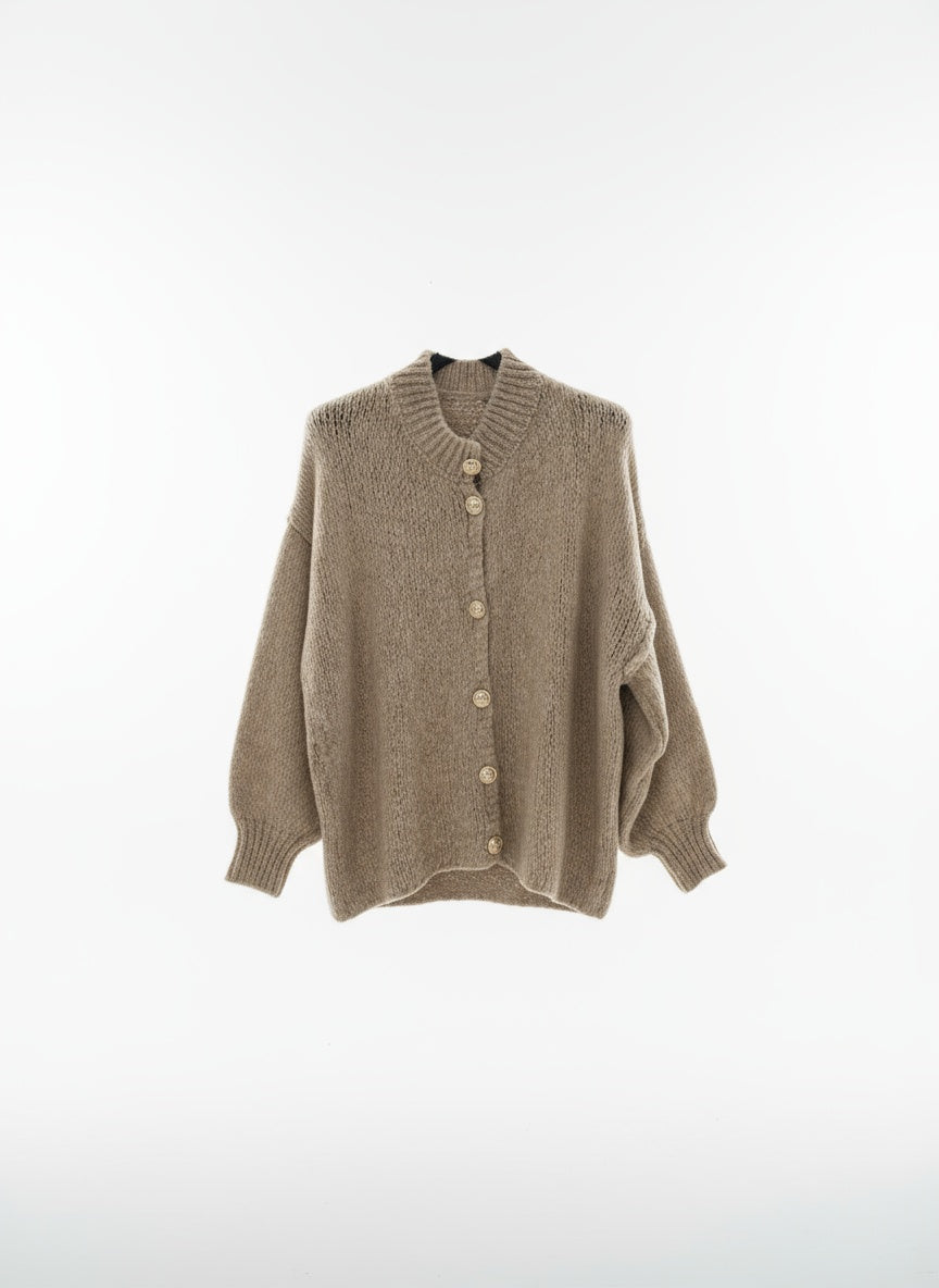 Vest met gouden knopen